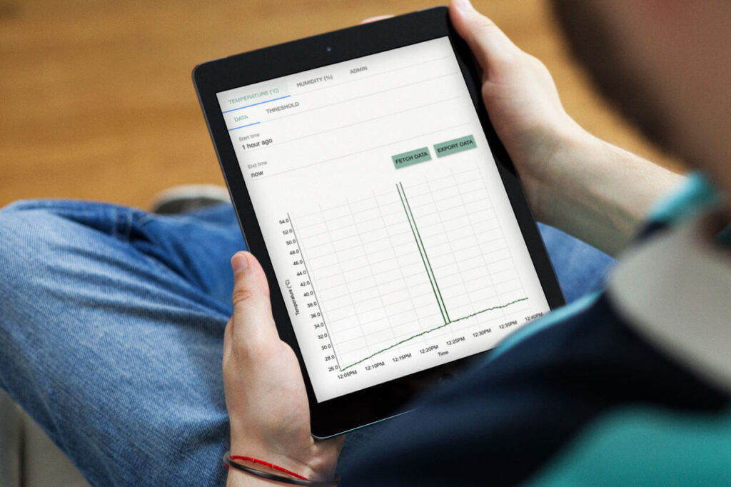 Man using a tablet to view genetic data curation software