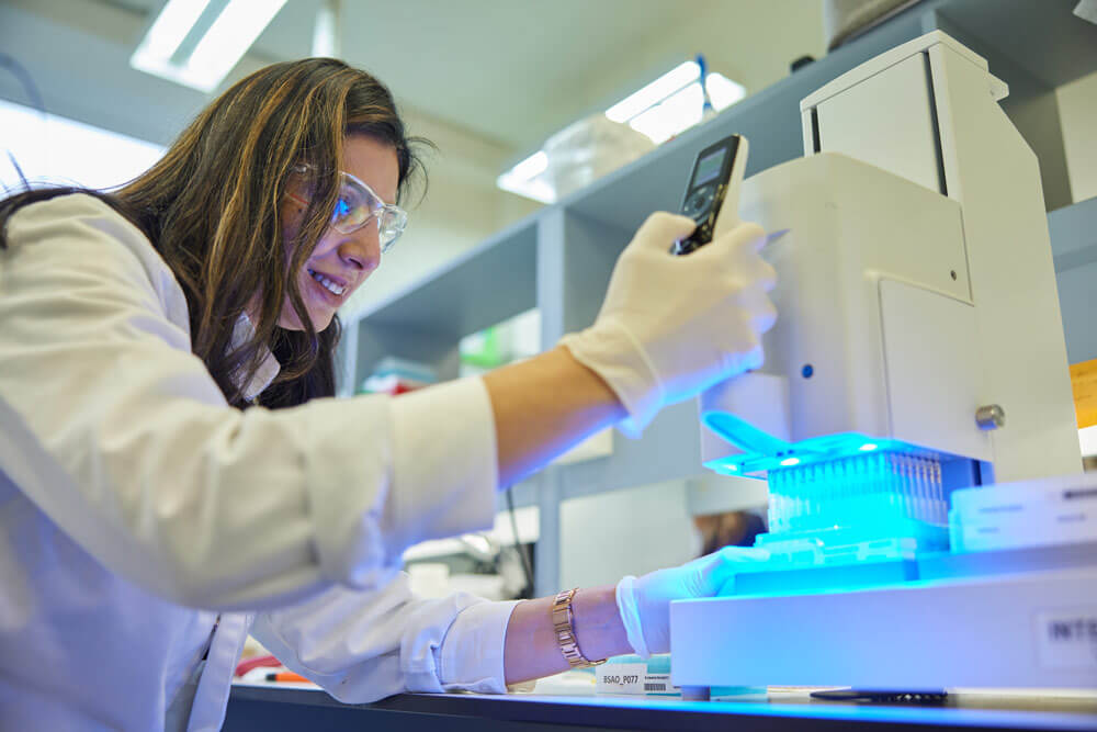 A scientist conducing genetic sequencing analysis for plants and crops in a Canberra laboratory